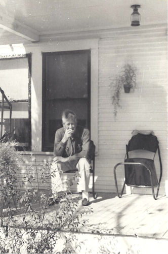 Alva J Ratfield on porch